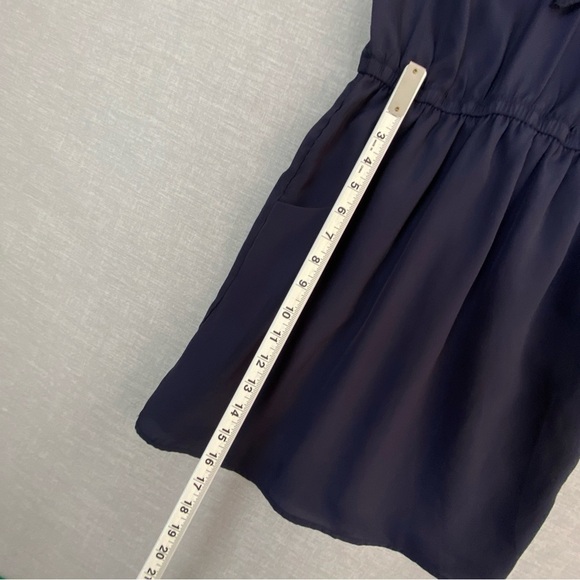 Sleeveless Mini Dress Alythea Purple Ruffled V-Neck Elastic Waist Pockets - Picture 10 of 11